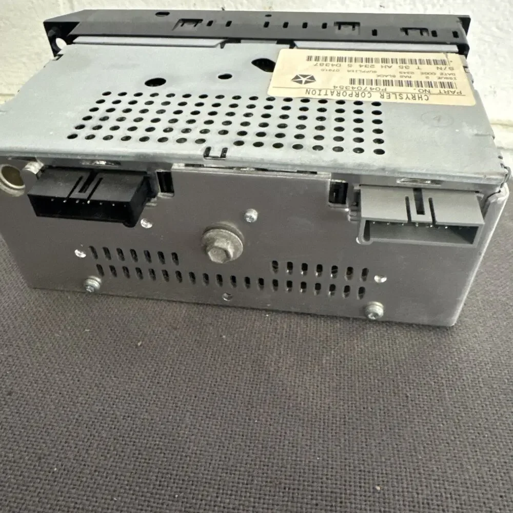Chrysler Corporation Radio Part No. P04704354 Am/FM Cassette Parts Only Untested